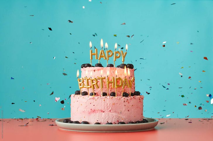 Birthday Cakes With Candles Happy Birthday Cake With Candles And Confetti Stocksy United Birthday Cakes With Candles Happy Birthday Cake With Candles And Confetti Stocksy United